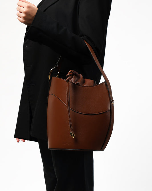 La Cemento Bag by Micucci Milano, shoulder bucket bag styled on model